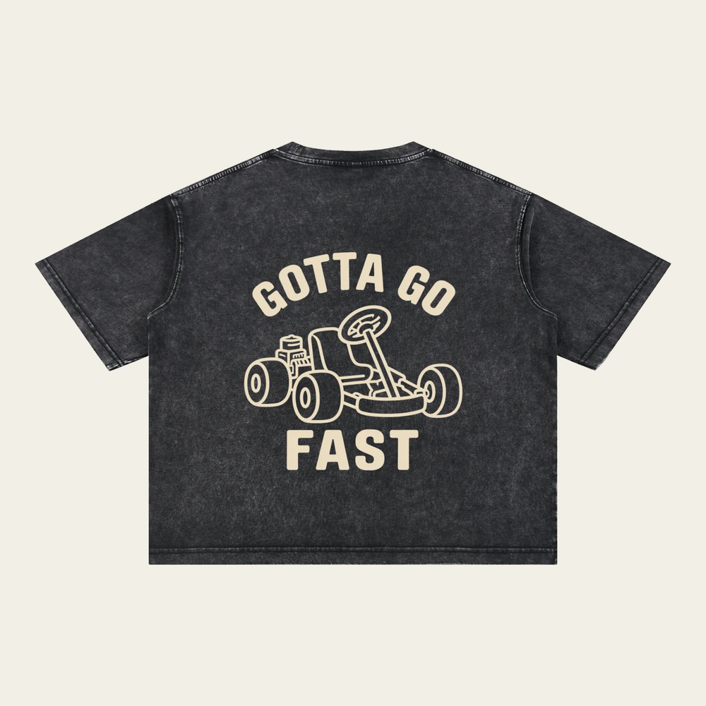 Back of the washed black Garage tee with the cream Gotta Go Fast go-kart graphic.